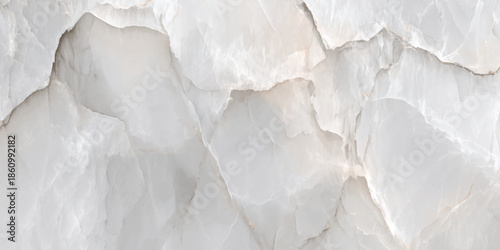 An abstract close up view of a white marble texture showcasing natural veins and a smooth polished surface