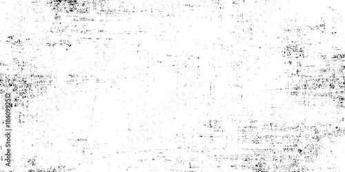A heavily distressed and grepsny black and white texture resembling an aged or damaged photographic film is shown