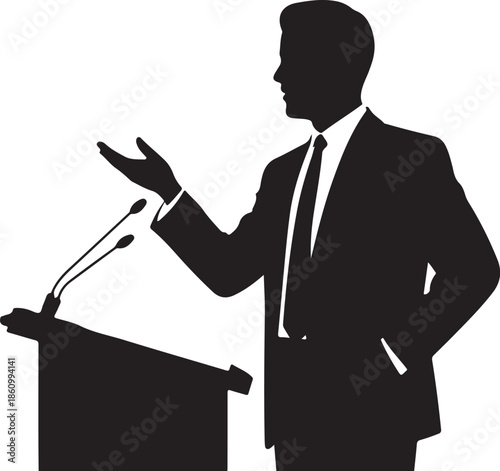 Man in suit speaking at podium with microphone