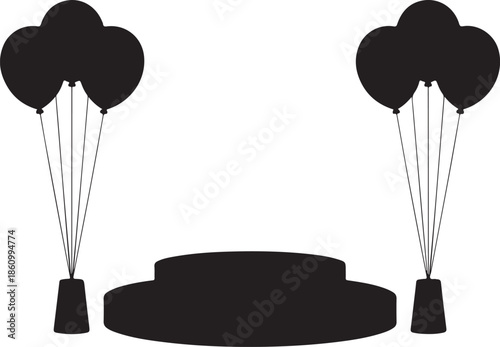 Two black hot air balloons tethered to a circular base