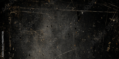 A dark textured background featuring subtle scratches dust particles and imperfections creating a grungy aesthetic