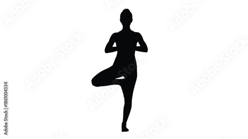 Woman practicing yoga in a balanced pose a striking silhouette