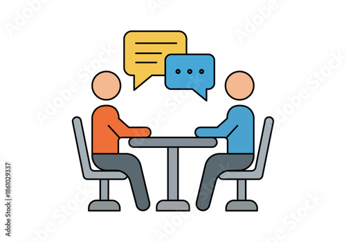 Dos personas sentadas frente a frente en una mesa de oficina manteniendo una entrevista profesional