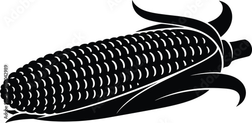 An abstract closeup of an industrial metal spring and silver corrugated tube isolated on a black background like a fish on a hook