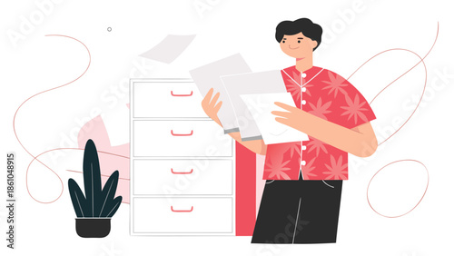 Man organizing documents in modern office space with plant