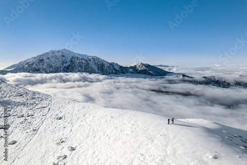 Above the clouds on mountain peak, Northern Grigna, Valsassina, Italy landscape