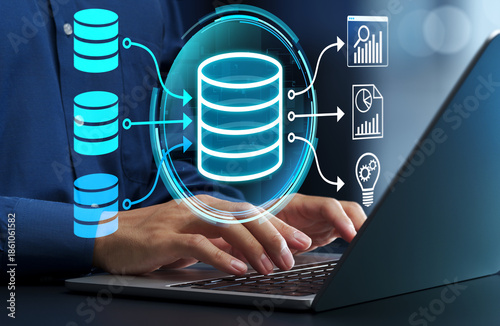 Data warehouse. Integrated database for business data analysis. Businessman leveraging business intelligence on laptop computer.