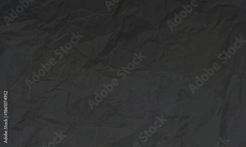 Close up view of dark gray crumpled paper texture background presenting a rough abstract surface detail