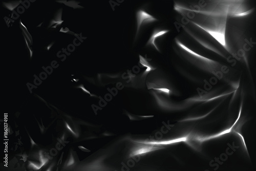 Abstract dark background texture showcasing dramatic light reflections across crumpled dark synthetic material surface