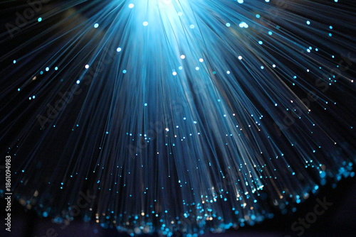 macro shot of fiber optic cable, abstract cyan on black