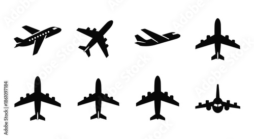 A collection of various airplane designs presented as black shapes a striking silhouette