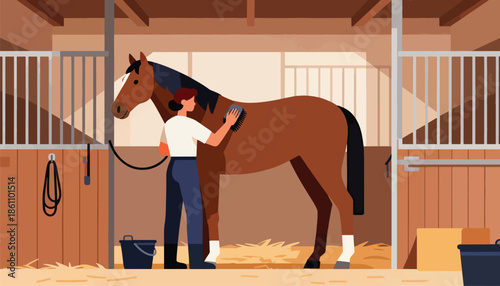 Person brushing a brown horse inside a stable with straw on the floor