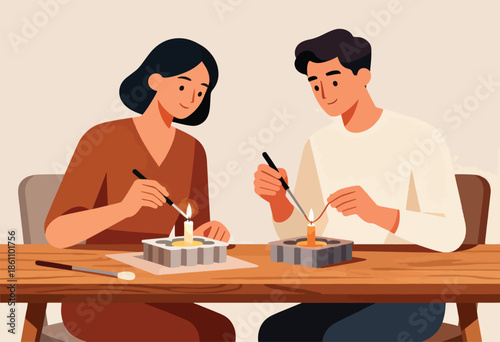 Couple crafting candles together at a wooden table