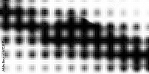 Dotted halftone texture background. Black and white pop art gradient overlay. Fading grunge gritty noise wallpaper. Weathered pixelated comic backdrop. Vector bitmap subtle vanishing surface