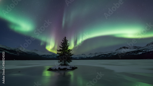 Breathtaking aurora borealis display over serene frozen lake