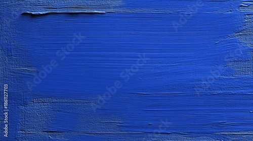 Abstract blue background. Dark blue grunge background. Rough grainy concrete wall surface texture