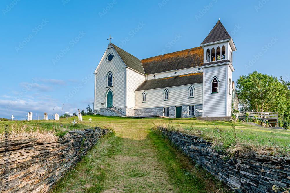 Obraz premium The historic St. Georges Anglican Church and cemetery in Brigus, NL