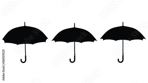 Three black umbrellas displayed in a row a striking silhouette