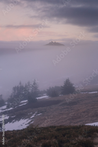 Autumn landscapes of the Karkonosze Mountains near Śnieżka, captured before winter. Dramatic sunrise and sunset light over ridges, valleys, and alpine scenery.