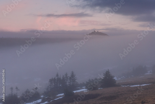 Autumn landscapes of the Karkonosze Mountains near Śnieżka, captured before winter. Dramatic sunrise and sunset light over ridges, valleys, and alpine scenery.