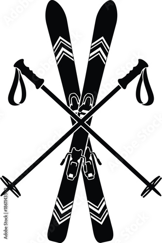 Skis and ski poles crossed on snow sports background