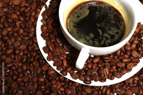 black coffee aroma coffee beans with black hot coffee in cup no people on a white background stock photo stock image