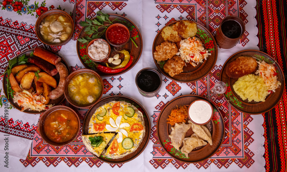 custom made wallpaper toronto digitalTraditional Ukrainian cuisine set on embroidered tablecloth, borscht, varenyky, potato pancakes, sausages and lard, festive dinner top view
