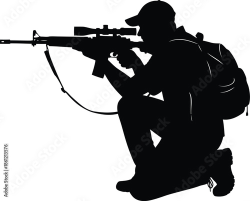 Silhouette of a soldier aiming a rifle in a tactical pose