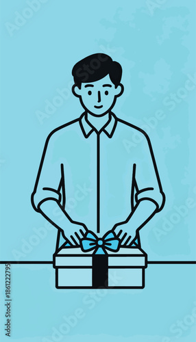 Man tying a blue ribbon on a gift box