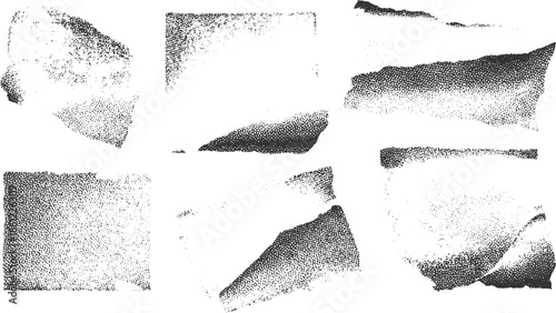 Six torn paper fragments with stippled texture and rough edges