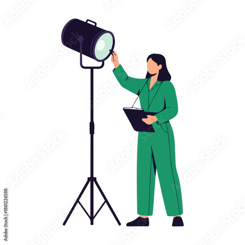 Woman Adjusting Studio Lighting Equipment.