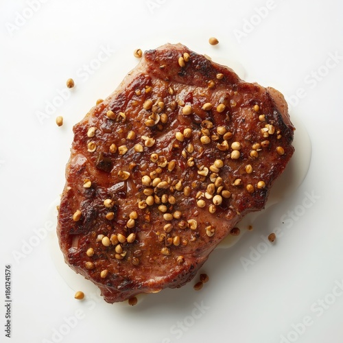 Perfectly Seared Beef Steak Covered in Fragrant Spices on White Background