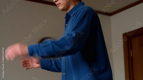 Businessman gesturing dynamically in modern office space