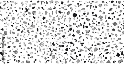Dark terrazzo texture showcases a speckled design with black, Gray, and white stone fragments creating a modern surface