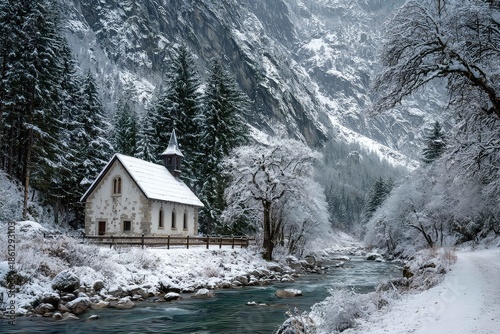 Snowy chapel in remote mountain valley