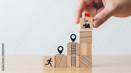 Businessman reaching top of career ladder with wooden blocks and flags