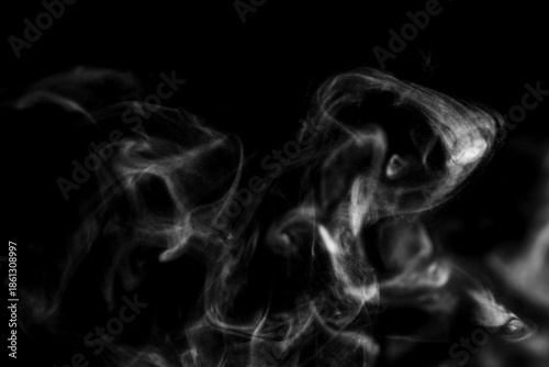 White steam smoke on solid black background with abstract blur motion wave swirl use as an overlay effect for vapor cigarette dry ice hot water and food soup