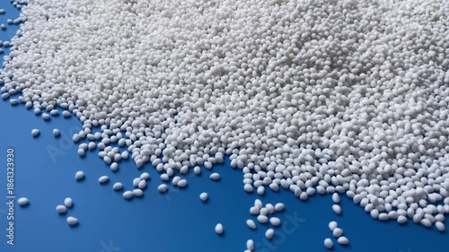 Plastic white granules are a raw material for industry. Concept: research, biochemistry, nature, pharmaceuticals.