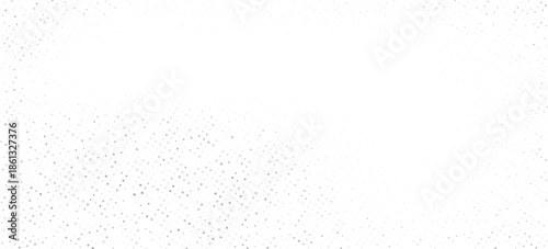 Abstract halftone dots background with smooth gray gradient effect on white space. Minimal and modern design suitable for banner, poster, presentation, wallpaper, web background, brochure