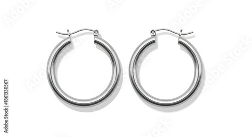 A stunning pair of gleaming sterling silver hoop earrings, exquisitely crafted with a flawless polished finish, embodying timeless elegance and