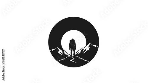 Silhouette of a lone hiker standing on a mountain path under a full moon.