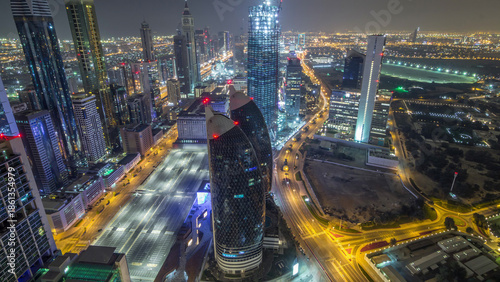 Skyline of the buildings of Sheikh Zayed Road and DIFC aerial night timelapse...