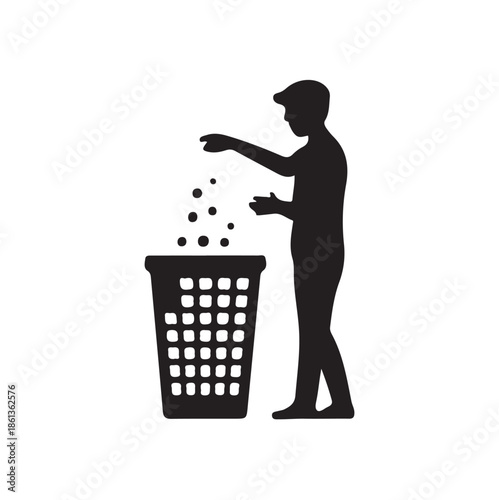 a silhouette of a person sprinkling or pouring something into a wastebasket depicting disposal or recycling