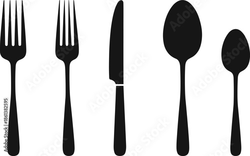 Set of black cutlery silhouettes including forks knife and spoons for dining