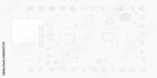 Overhead view of a modern house surrounded by trees and natural landscaping