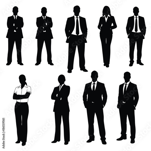 Group of business professionals standing in formal attire against a plain background