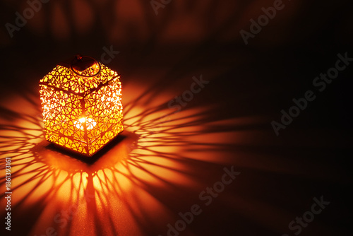 Arabic lantern with light rays Greeting card for Muslim community holy month Ramadan Kareem