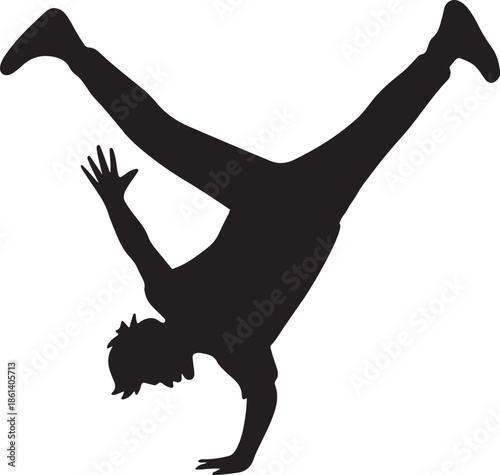 Man doing breakdance move in silhouette