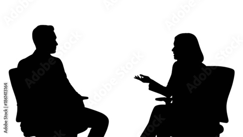 Professional silhouettes of a man and a woman engaged in a business discussion