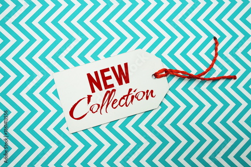 Foto Price tag with New Collection is placed on a colorful zigzag patterned backgro